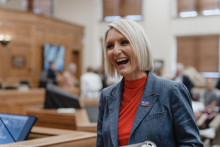 Christine Erickson laughing with supporters at her mayoral inauguration, photographed by Lloyd Duimstra, Sioux Falls SD