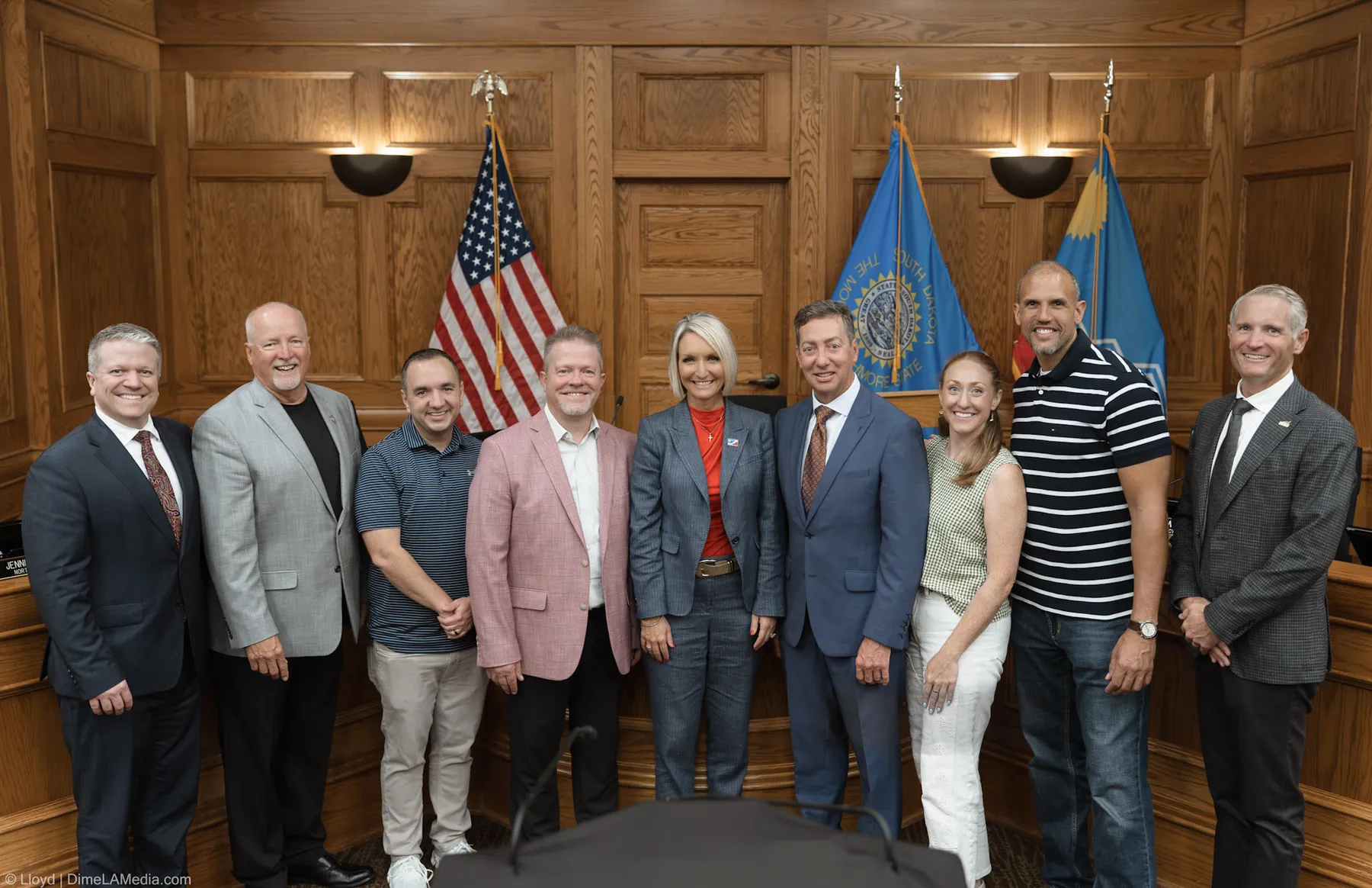 Mayor Christine Erickson stands with city leaders for a group photo in the council chamber