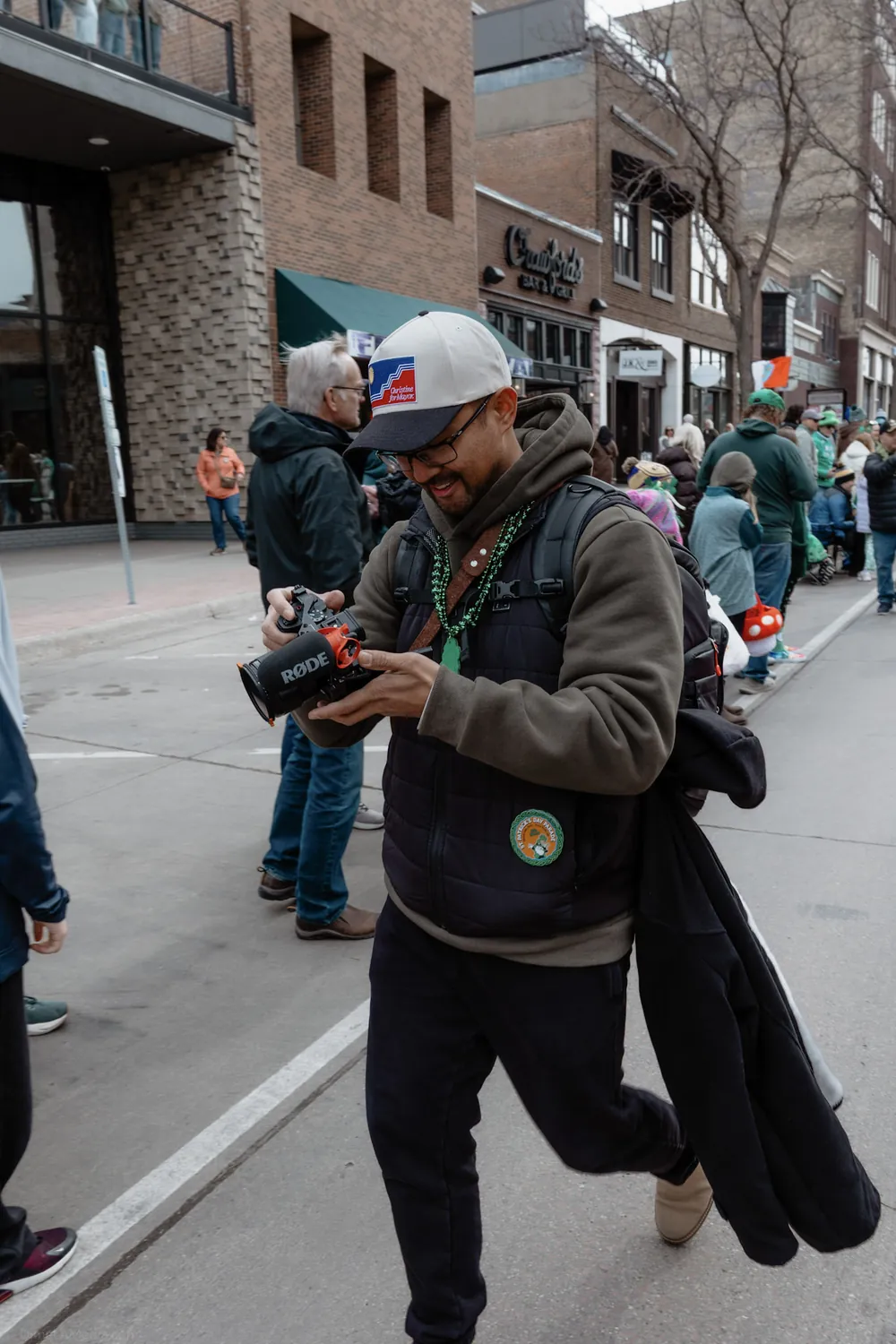Lloyd Duimstra of Dime LA Media carrying camera gear while covering the Christine Erickson campaign