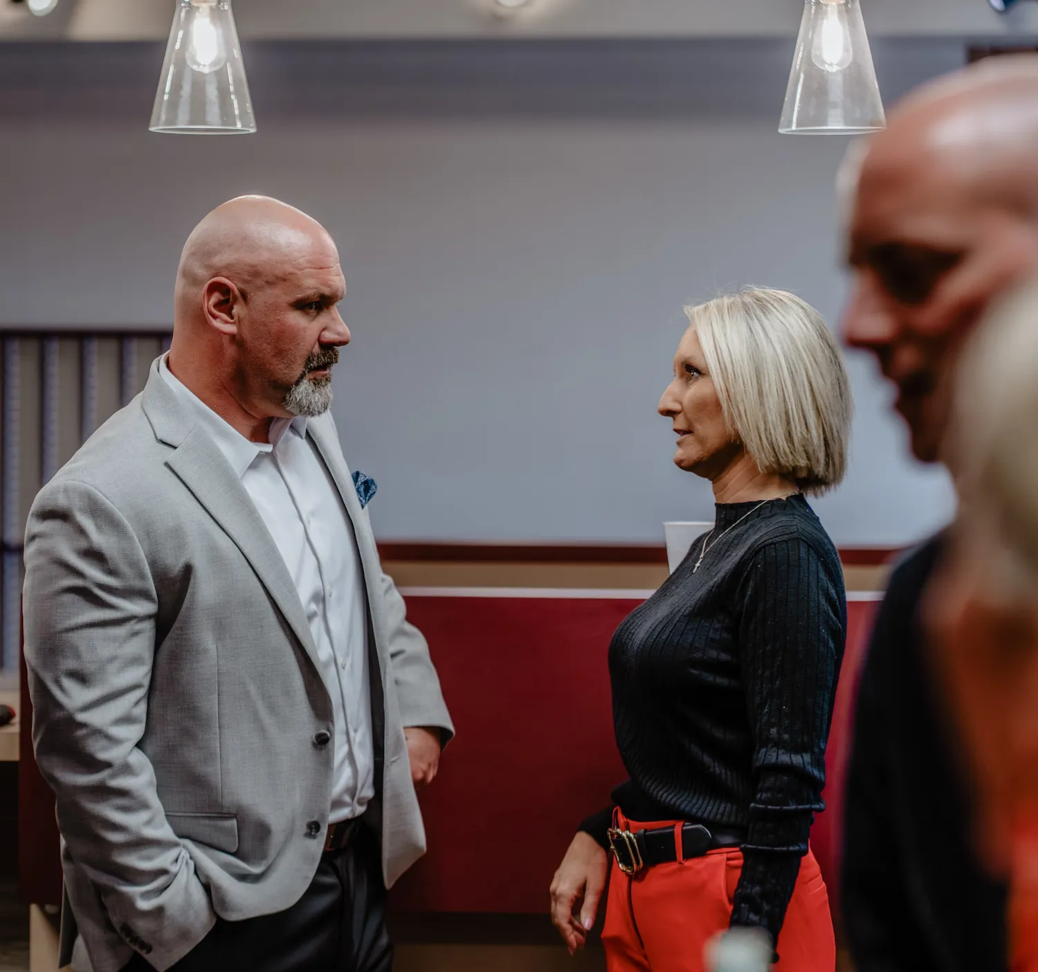 Christine Erickson in conversation at a campaign meet and greet in Sioux Falls
