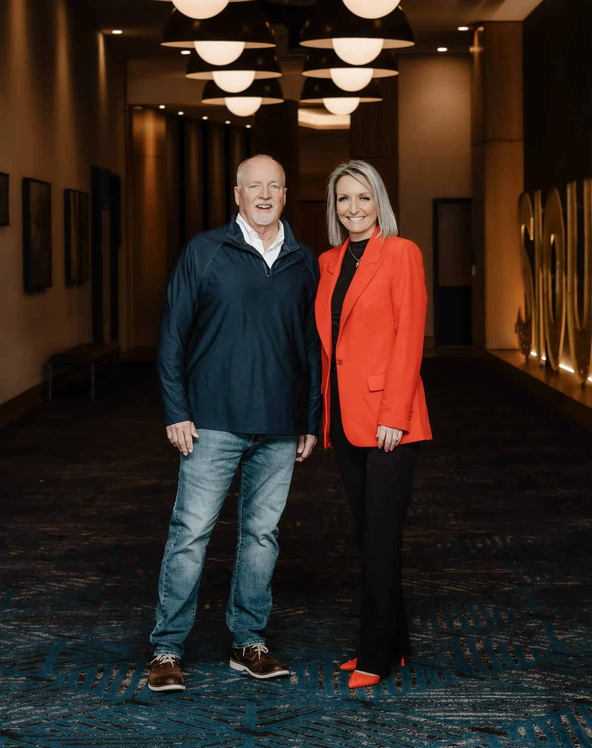 Christine Erickson with a supporter at a campaign event in Sioux Falls