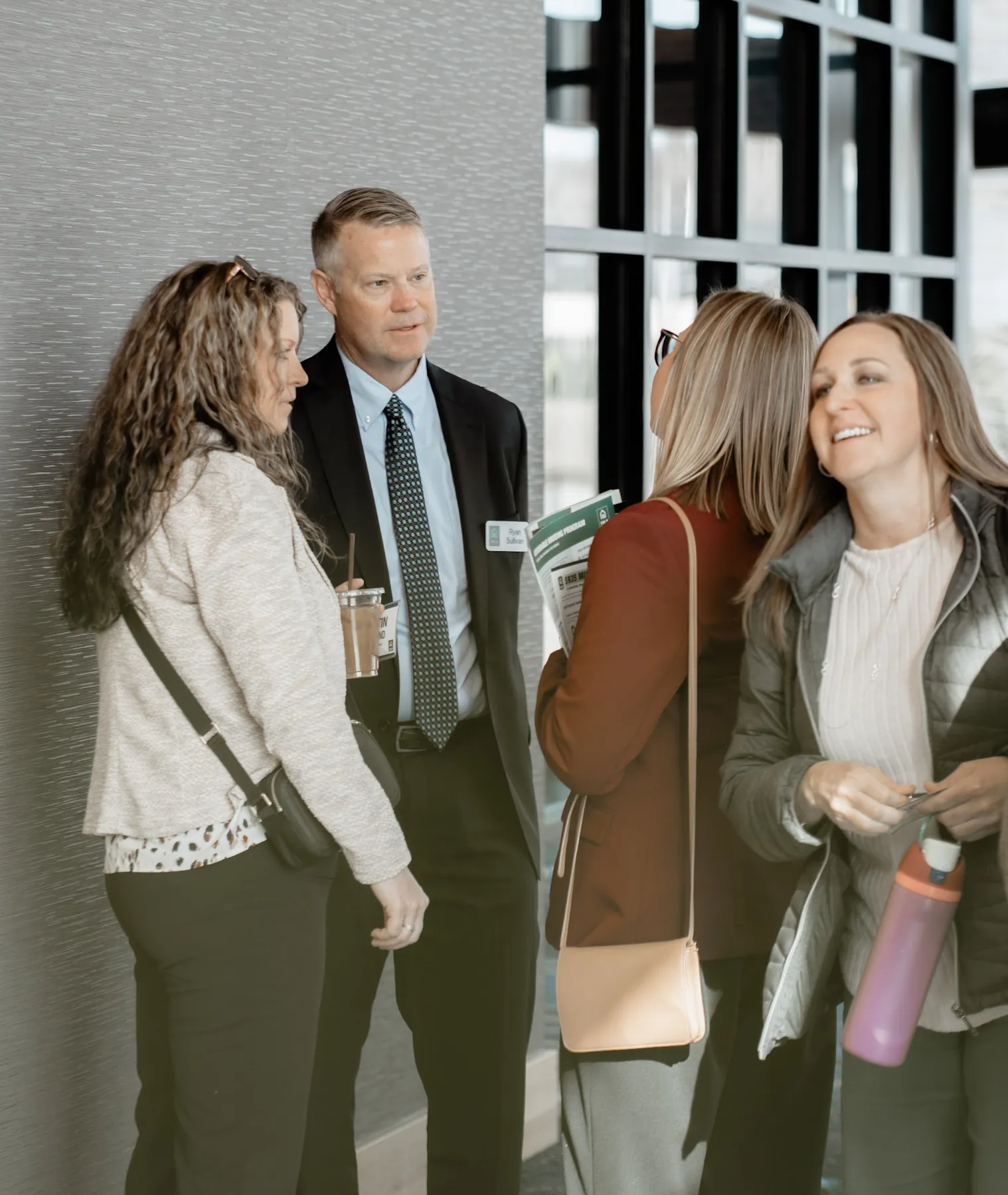 Guests networking during a break at a Sioux Falls corporate event