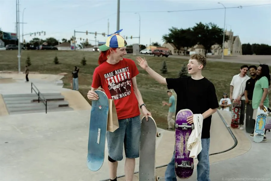 Two skaters laughing as prizes are handed out at the Siouxer Summer Showdown, Barb Iverson Skate Plaza, Sioux Falls SD