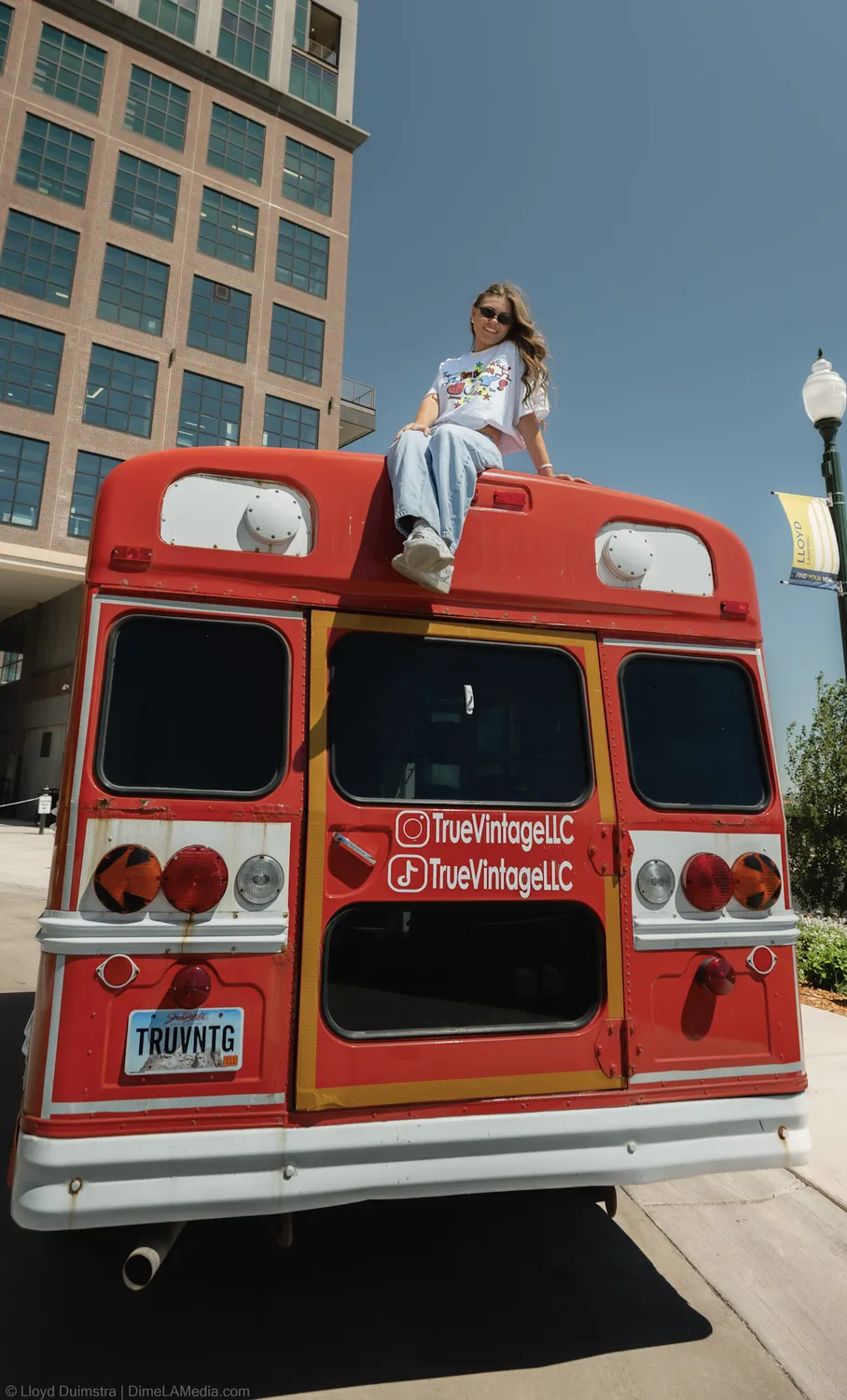 Maddie Theisen on the roof of the True Vintage bus in downtown Sioux Falls