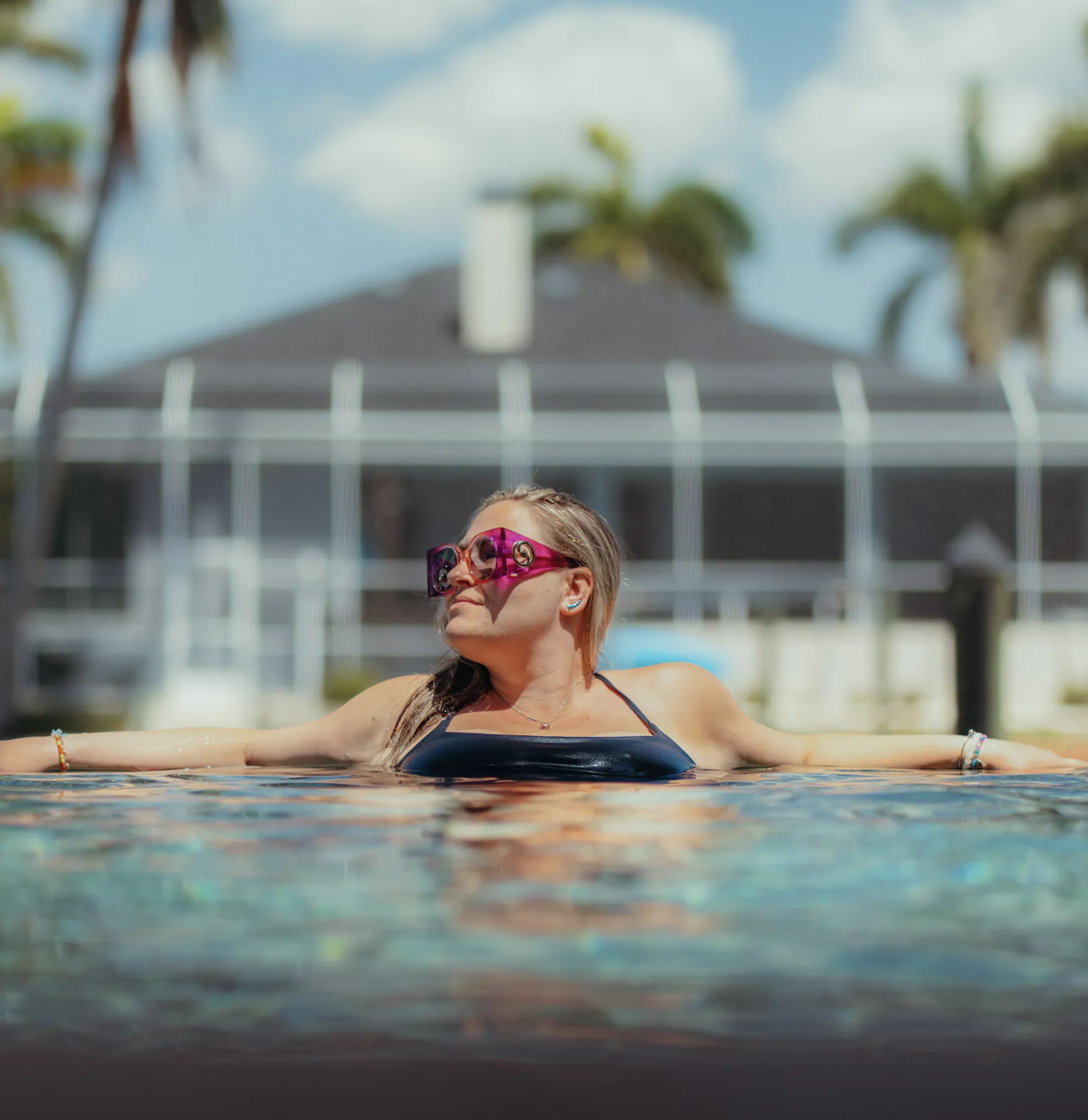 Poolside editorial portrait, resort style