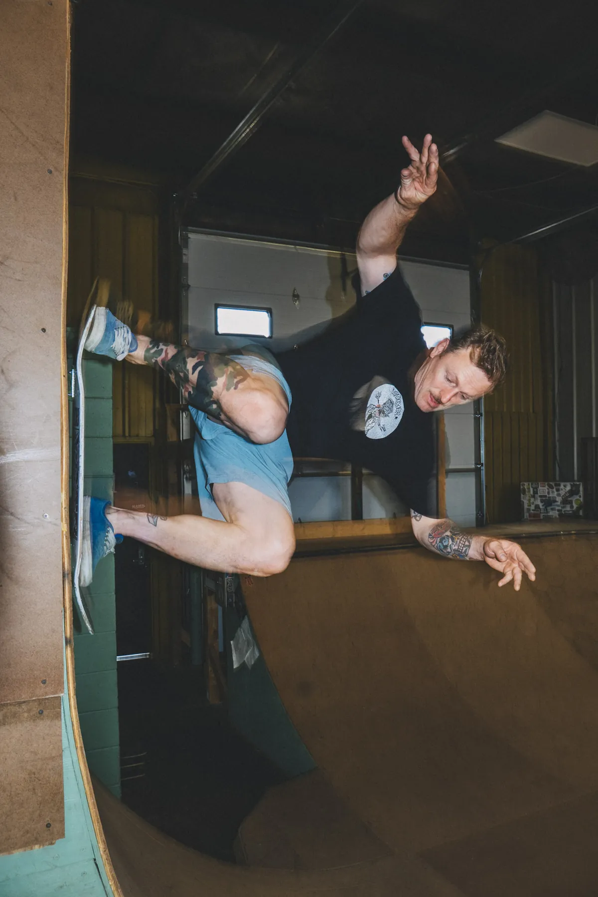 Skater floating an air in the indoor bowl