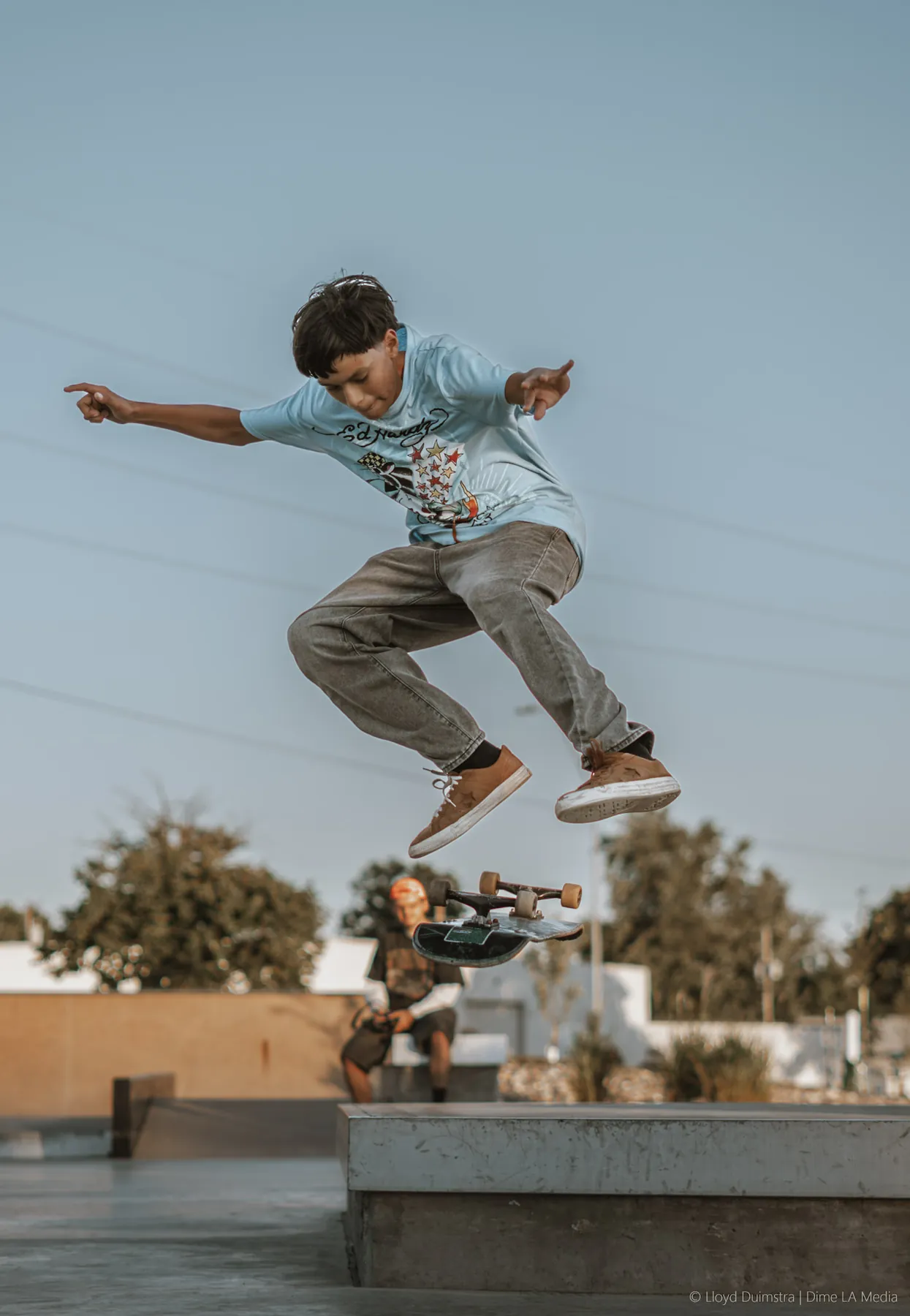 Skater popping over the pyramid at the park
