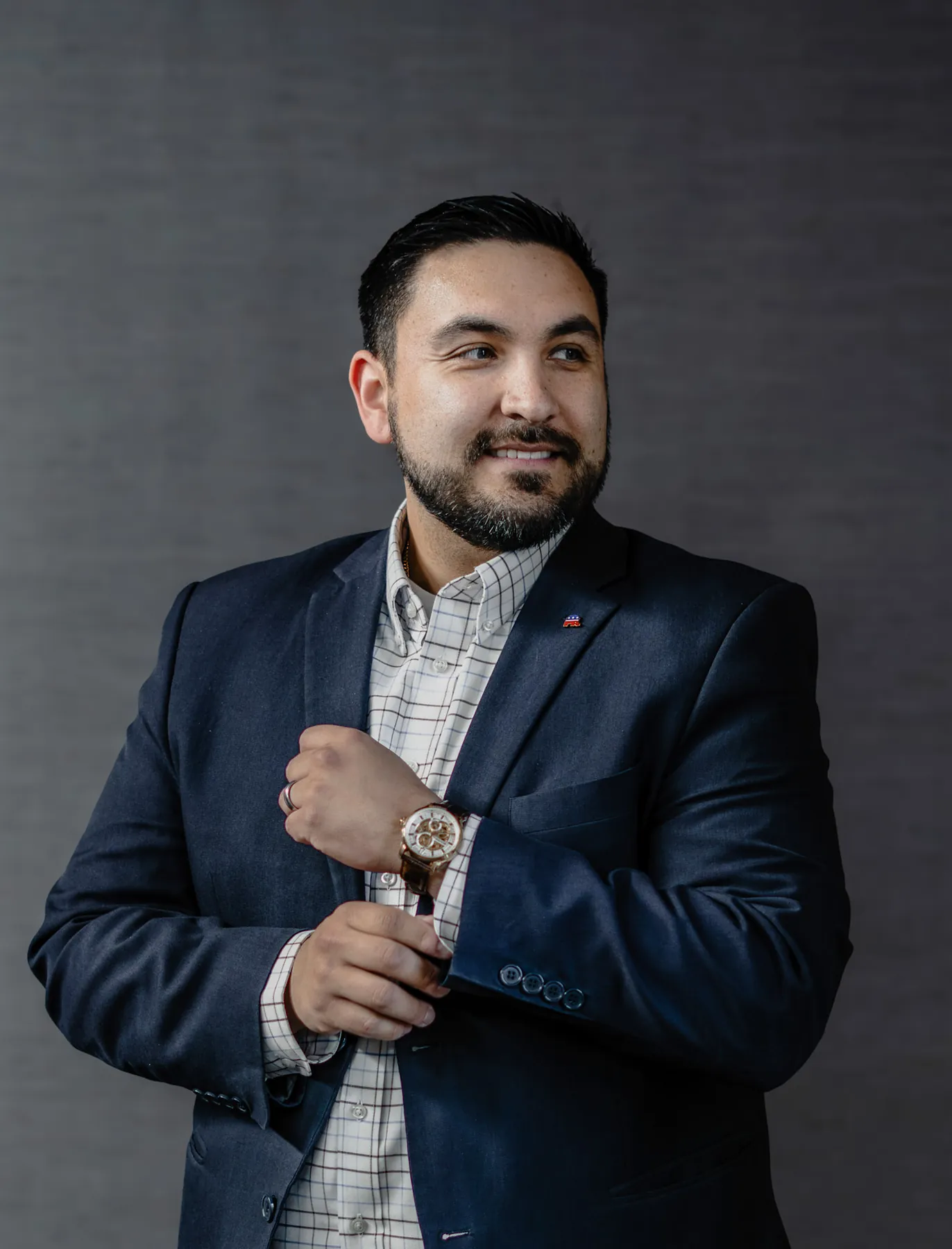 Tyler Tordsen business portrait adjusting his watch, Sioux Falls SD