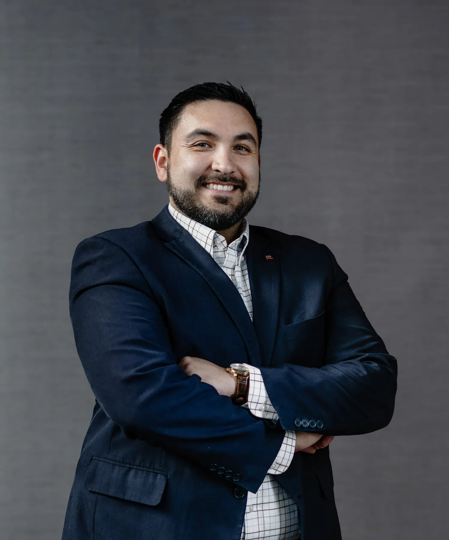 Arms-crossed business portrait of Tyler Tordsen of the Sioux Metro Growth Alliance