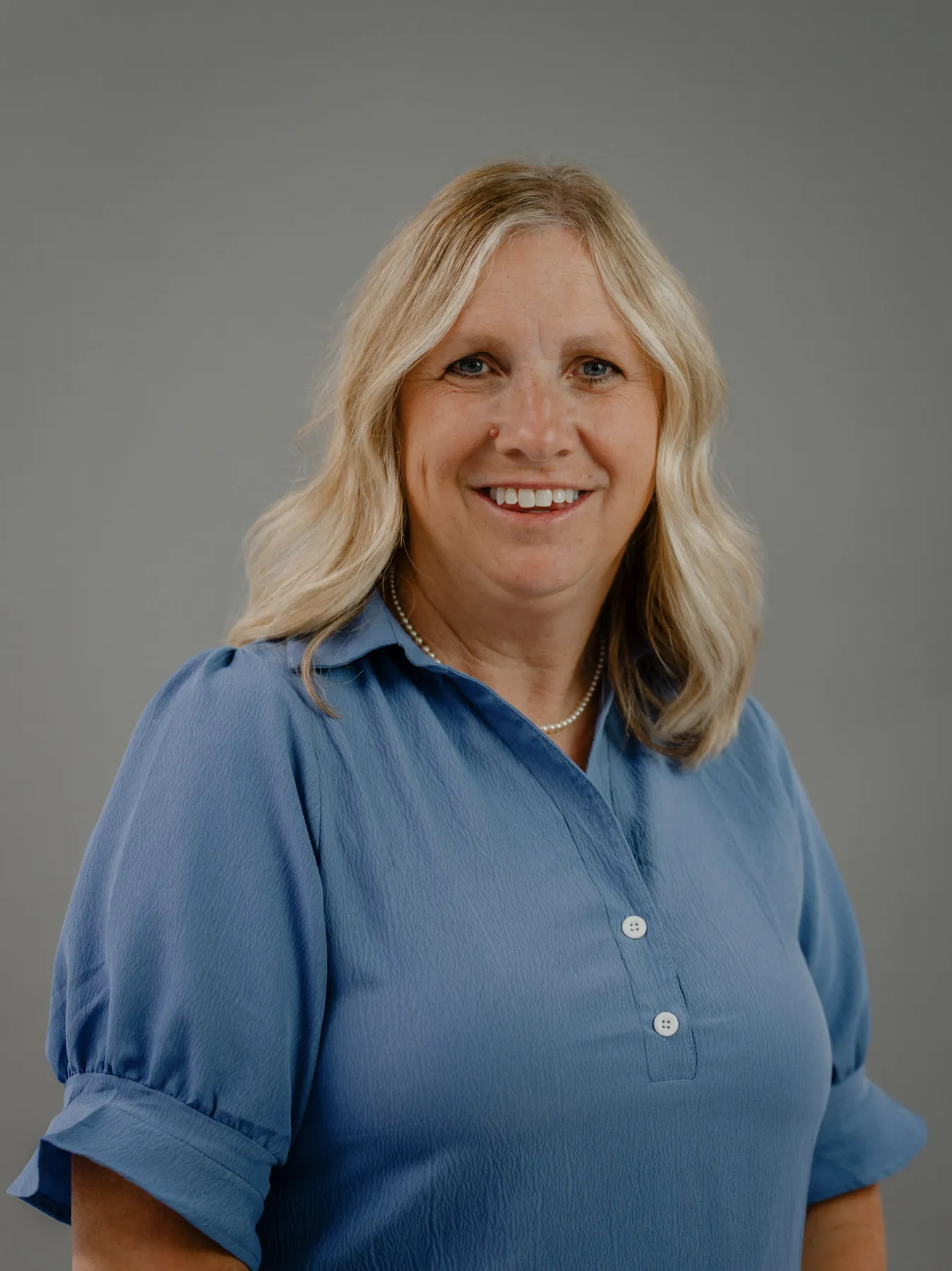 Corporate headshot from a Sioux Falls on-site team headshot session