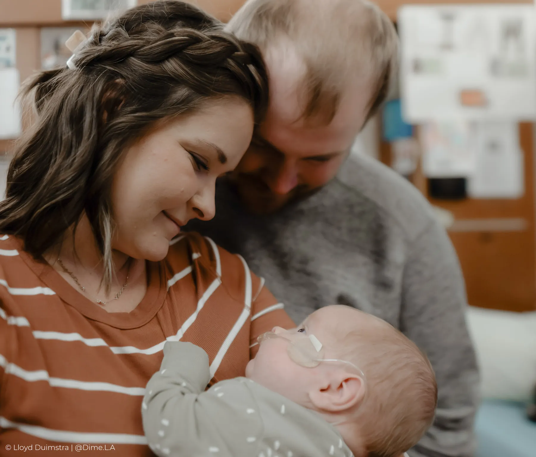 Newborn looking up at his parents, Sioux Falls newborn photography