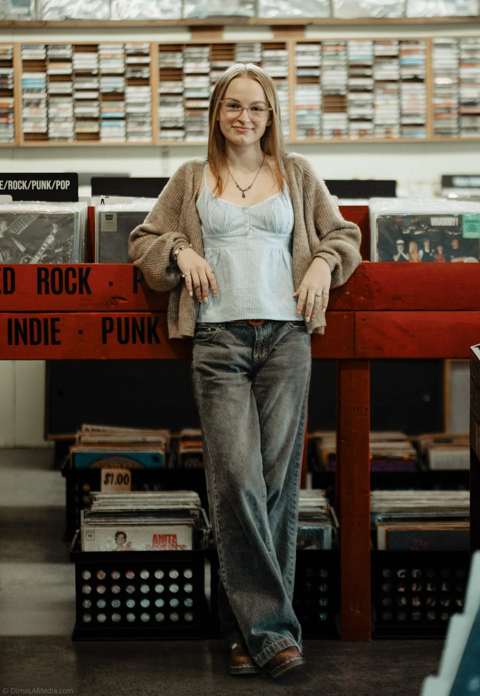 Syd Patzwald senior portrait in a Sioux Falls record store