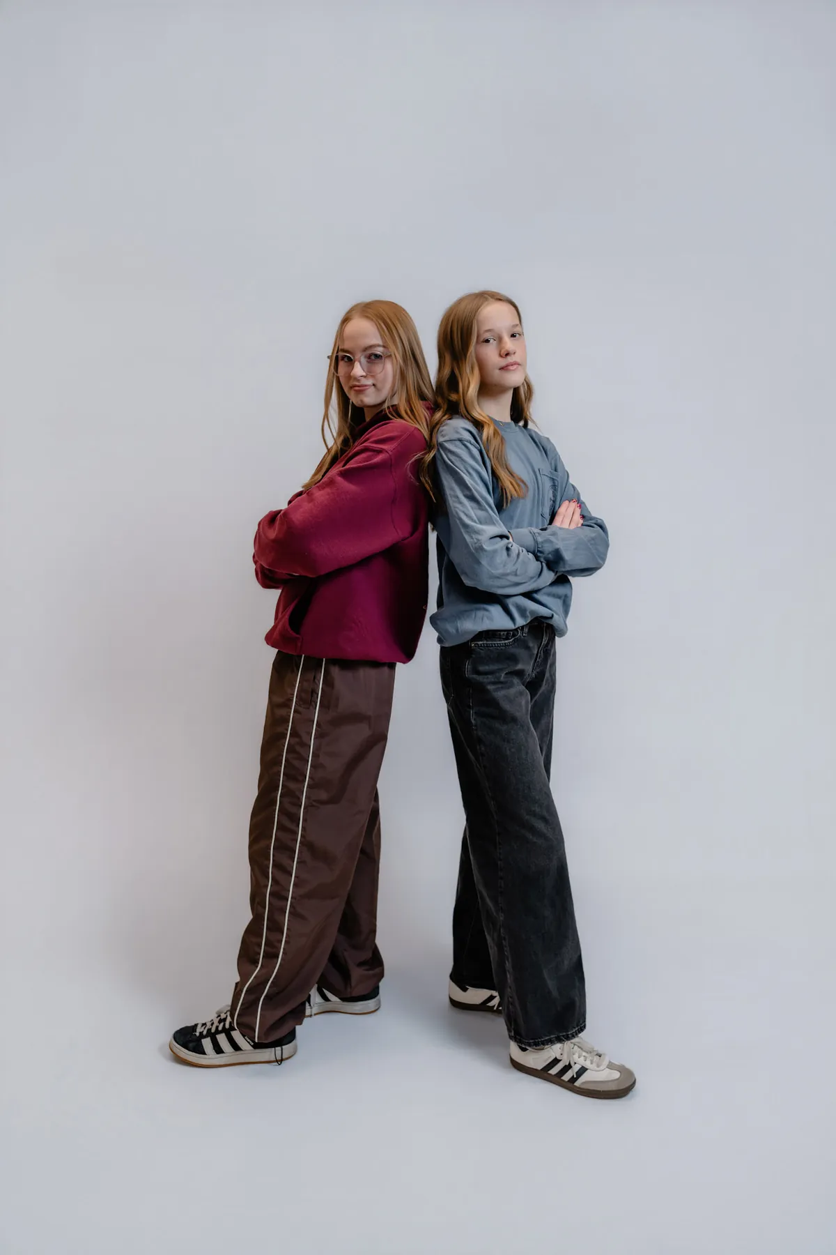 Back-to-back studio portrait of Syd Patzwald and a friend