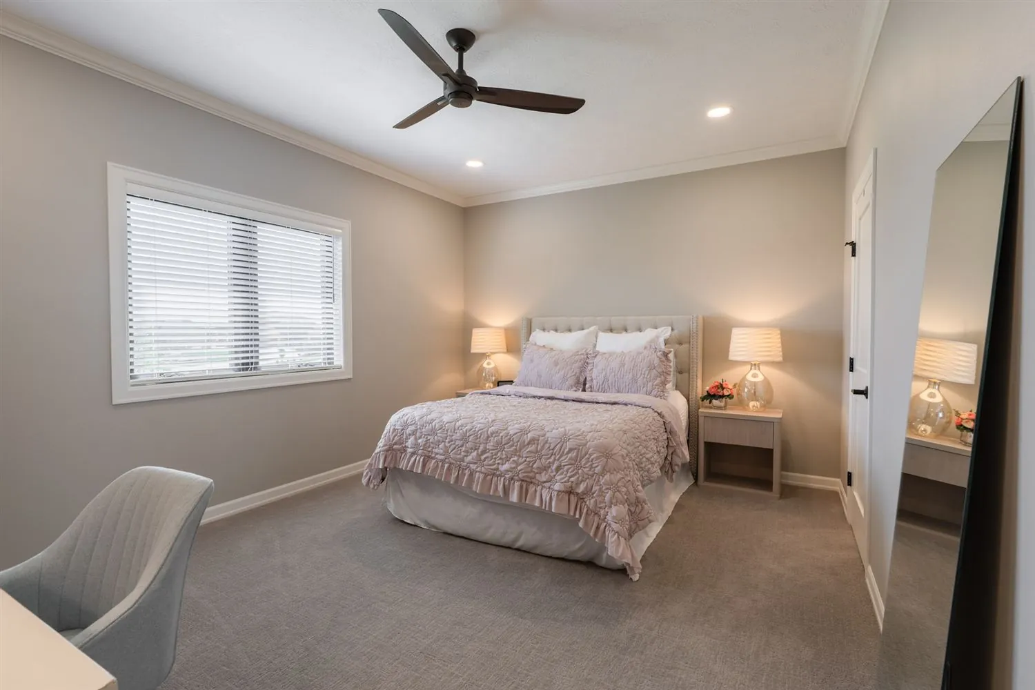 Bedroom with soft lamplight and nightstands, real estate photography Sioux Falls SD