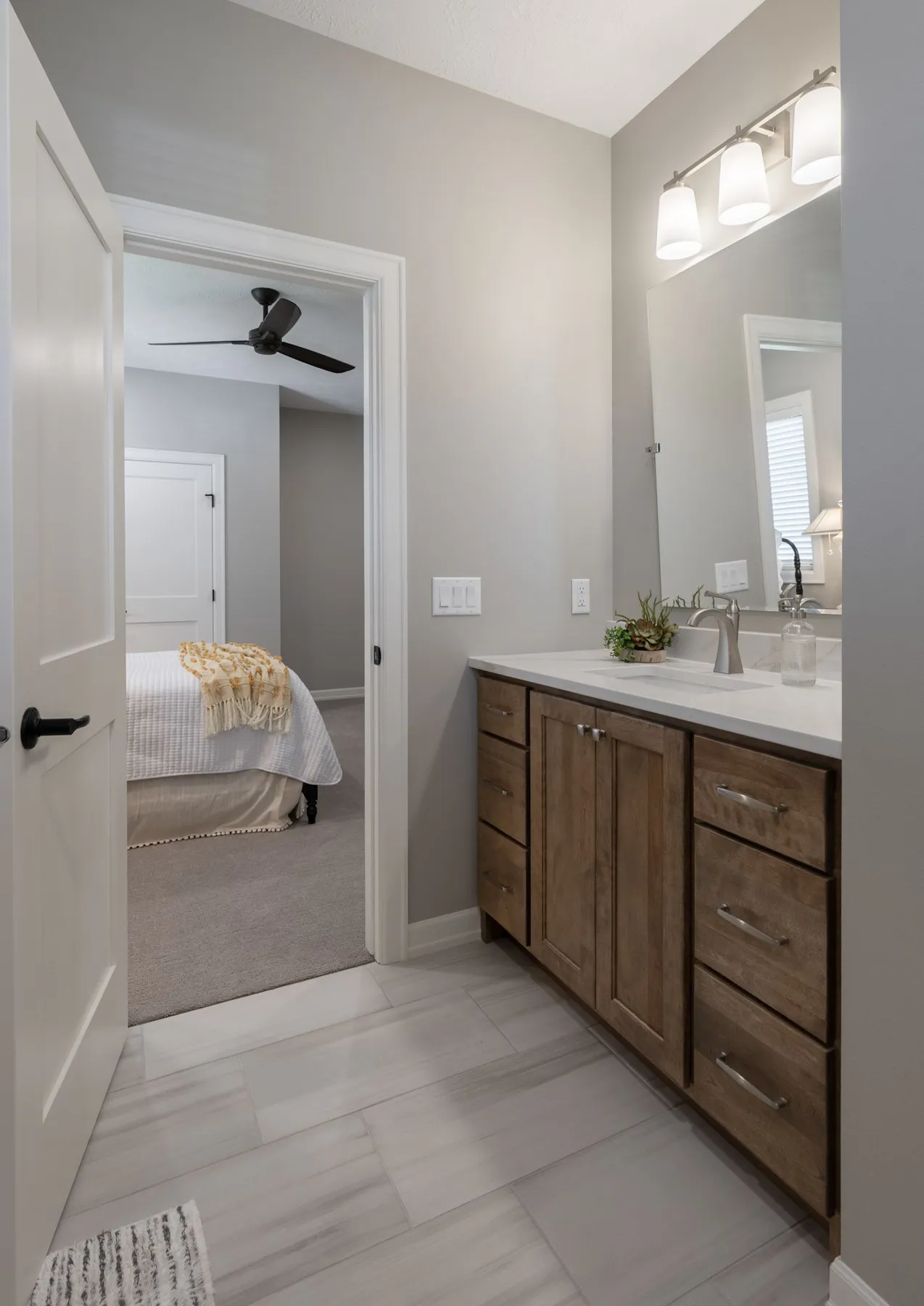 Bathroom vanity with framed mirror, real estate photography Sioux Falls SD