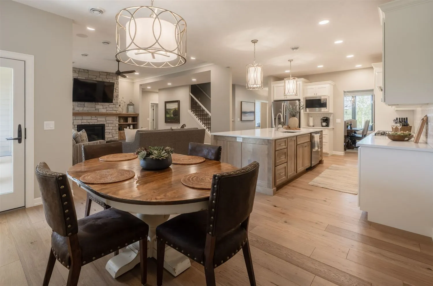 Open concept kitchen and dining sightline, real estate photography Sioux Falls SD